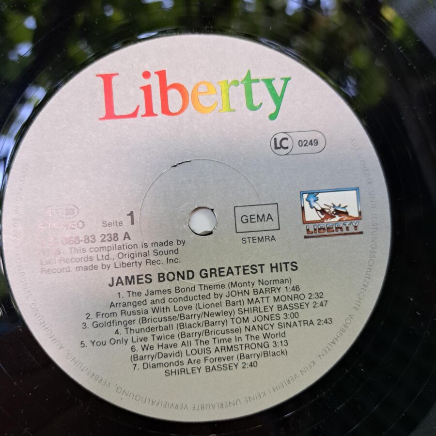 James Bond Greatest Hits – Disc Vinil LP VG+ (lotC) - John Barry, Carly Simon, Lulu, Shirley Bassey, Tom Jones