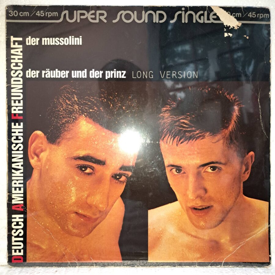 Deutsch Amerikanische Freundschaft – Der Mussolini Der Räuber Und Der Prinz (1) Deutsch Amerikanische Freundschaft – Der Mussolini / Der Räuber Und Der Prinz – Disc Vinil MAXI 45 RPM VG (lotD)